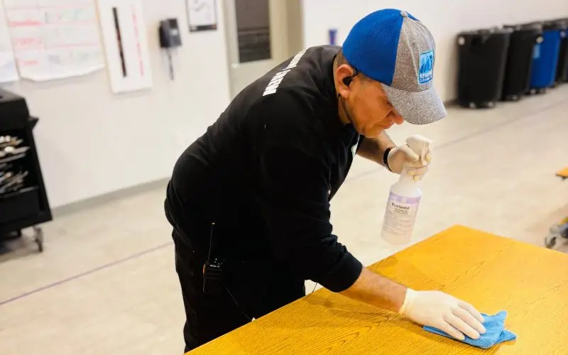 Cleaning and disinfection of school classroom tables and chairs