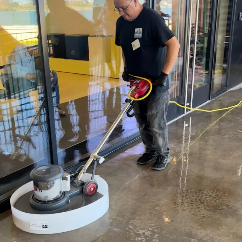 Pressure washing concrete side walk in NYC